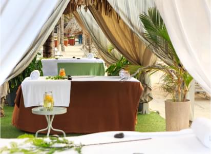 Luxurious massage tables on the beach