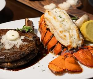 Steak and lobster on a plate