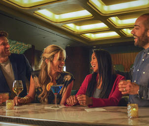 Four people drinking at the Mixx bar