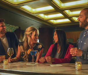 Four people drinking at the Mixx bar
