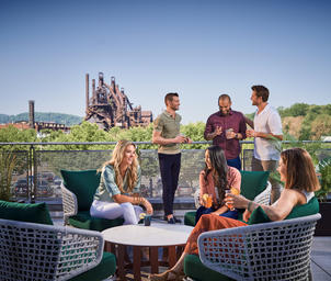 Several people drinking on the Wind Creek Bethlehem terrace