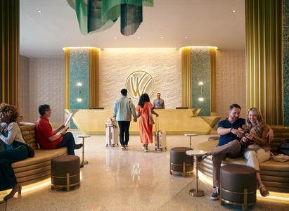 A couple walking towards a hotel reception